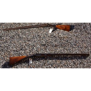 Old side by side pin-fire shotgun