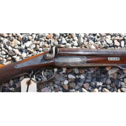 Old side by side pin-fire shotgun