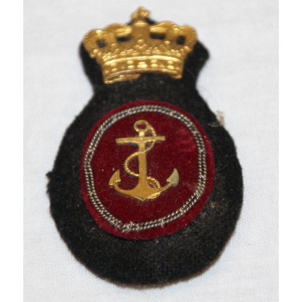 Svrnet, kasketemblem - 6 x 3,5 cm