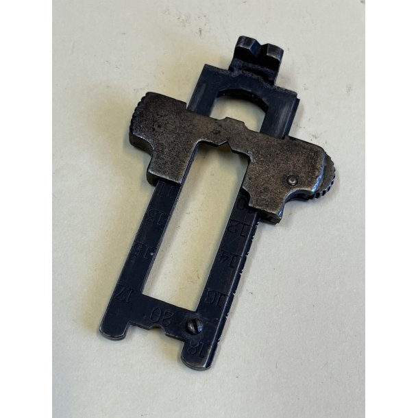 Sliding safety, scale and pin f. sight (rifle)